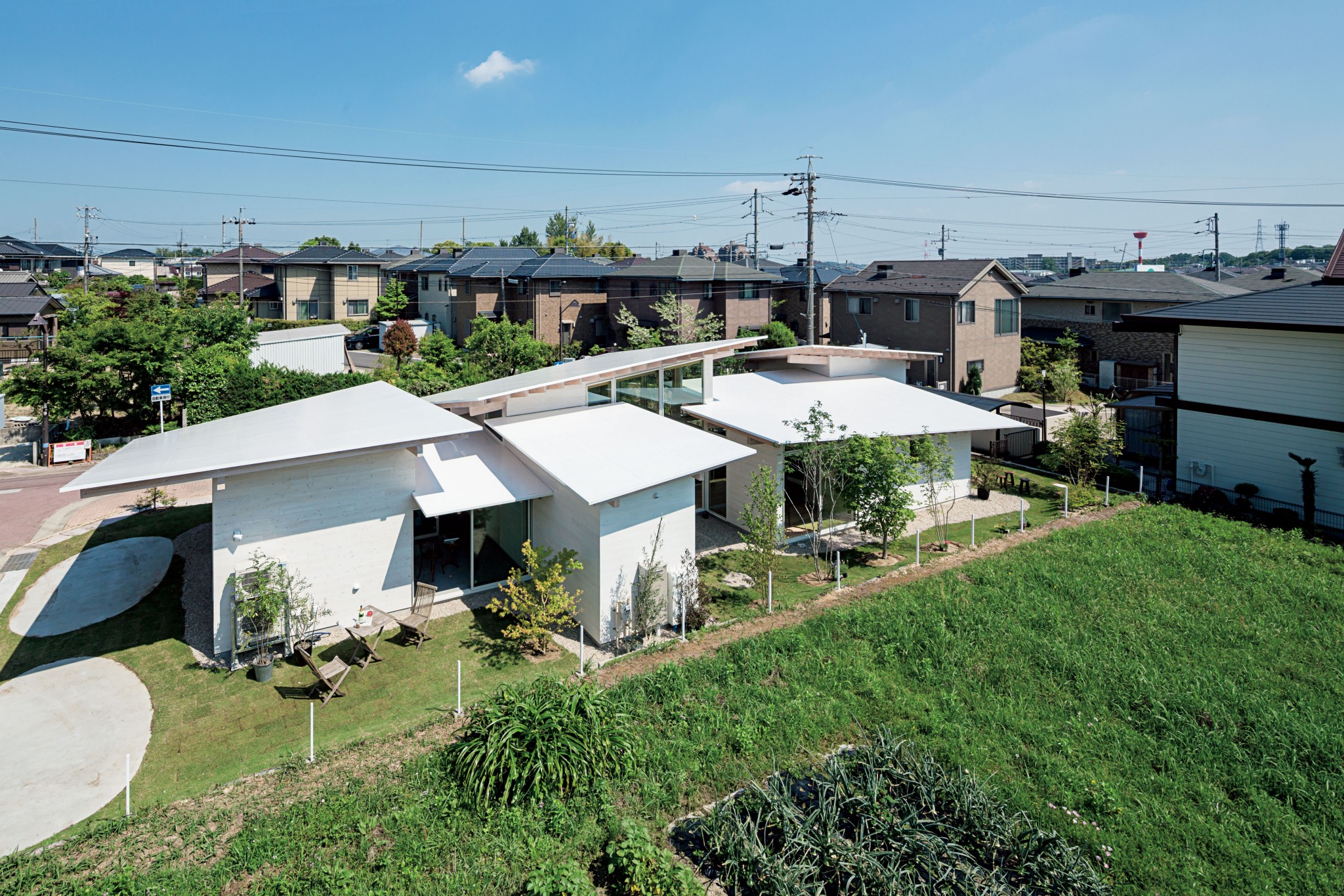 まちに架かる6枚屋根の家 設計 栗原健太郎 岩月美穂 Studio Velocity一級建築士事務所 施工 誠和建設 株式会社新建築社